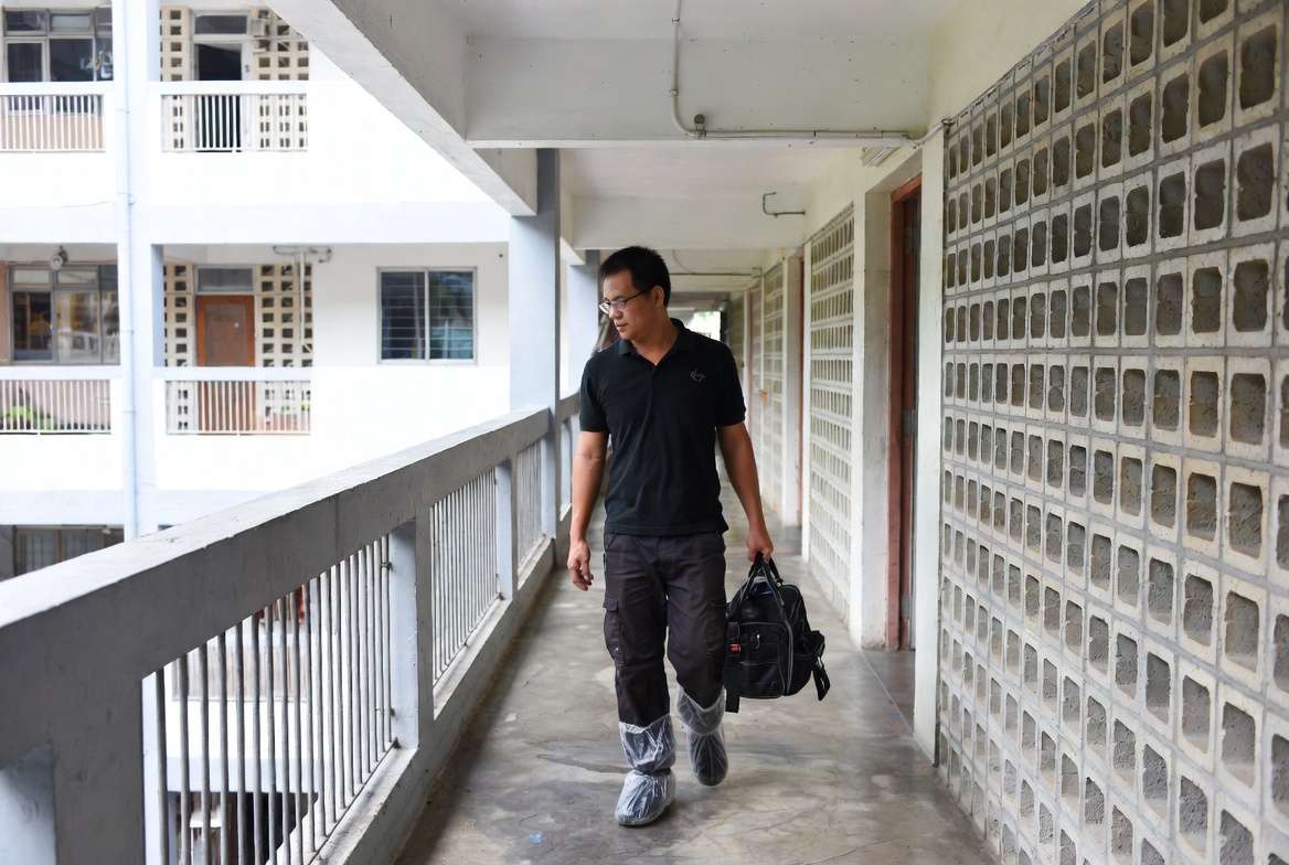 Technician on-site at an HDB flat